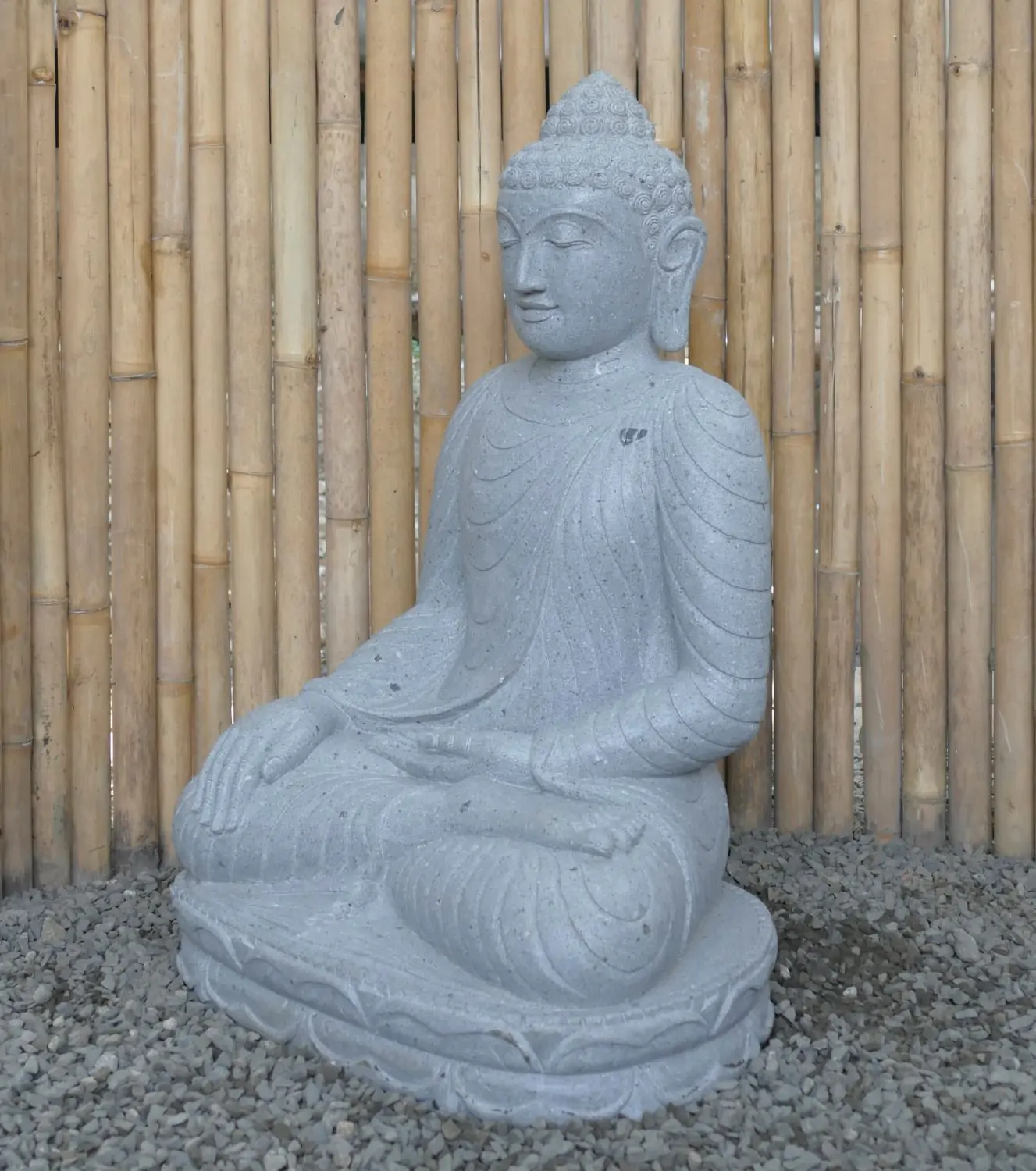  Product image 2 of the product “Seated Buddha made of Riverstone in Bhumisparsha - gesture of touching the earth. 89cm height. ”